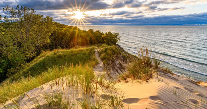 Sunset over Lake Michigan from a sand dune overlook at Indiana Dunes National Park