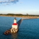 Aerial view of the Michigan City East Pierhead Lighthouse and pier at Washington Park Beach in Indiana